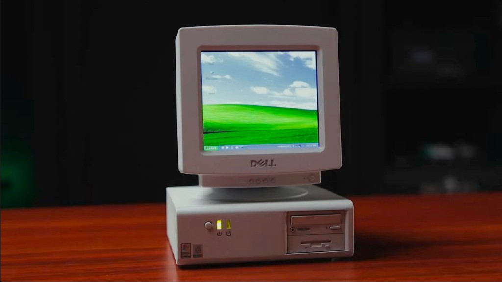Tiny PC — miniature retro-style desktop with monitor displaying Windows XP Bliss wallpaper
